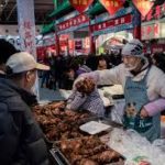 A year on, markets bustling in Chinese city where COVID-19 emerged