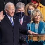 Biden rolls back Trump policies on wall, climate, health, Muslims