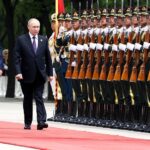 In first official trip abroad after his reelection, Putin visits China